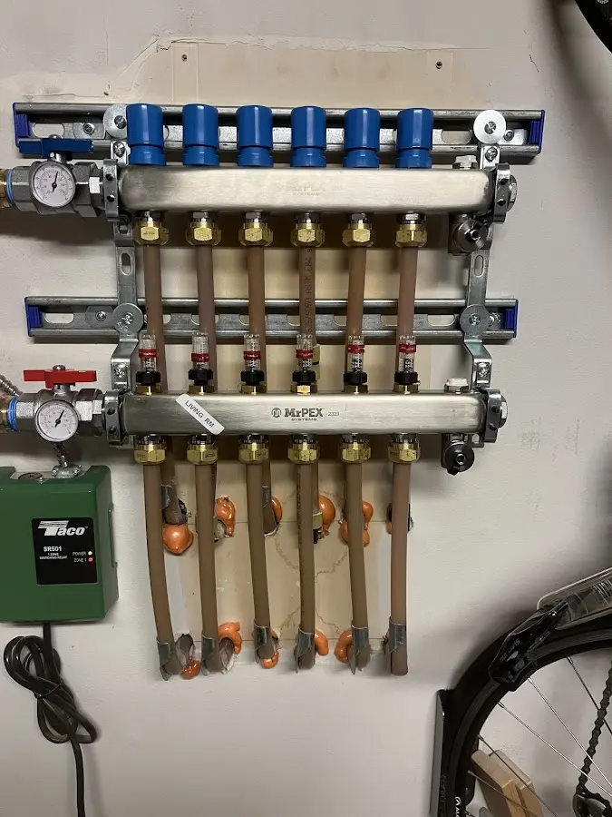 Plumber performing Water Heater Repair at a residential property in Archdale